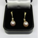 Pair of 18ct peach coloured pearl and diamond drop earrings, 2.7cm long approx, 4.2g total