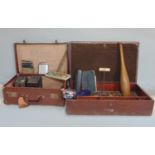 Two cases containing a collection of miscellaneous items to include a Brownie camera, two other
