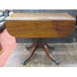 Regency mahogany Pembroke breakfast table of usual form with one real and one dummy drawer, two drop