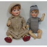 2 bisque head baby dolls by Armand Marseille both with 5 piece bent limb composition bodies;