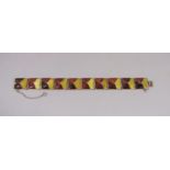 Silver panel bracelet composed of ten square links inlaid with amber, maker 'G Ltd', 19.8cm long