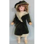 Bisque head doll by Kammer & Rheinhardt with composition jointed body, sleeping blue eyes, pierced