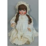 C1919 Bisque head baby doll by Bahr & Pröschild with composition body, bent limbs, closing blue