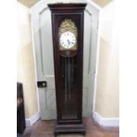 20th century longcase clock in the 19th century French manner, the glazed case enclosing an embossed