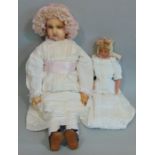 19th century wax over composition shoulder head doll with stuffed soft body and hollow wax lower