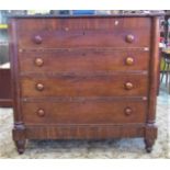 A substantial 19th century mahogany bedroom chest of four long graduated drawers flanked by split
