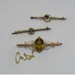 Three 9ct gem set bar brooches comprising a citrine, a garnet and an aquamarine example, 7.5g