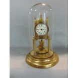 Good quality brass torsion clock with weighted pendulum under a glass dome, the dome 30 cm high