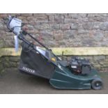 A Hayter Harrier 48 petrol driven rotary lawn mower with rear roller and grass collection bag,
