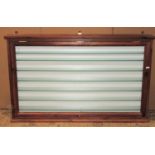 contemporary stained pine wall mounted collectors cabinet enclosed by a rising rectangular glazed