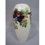 A tall Moorcroft ivory ground vase of ovoid form with painted aquilegia decoration with painted
