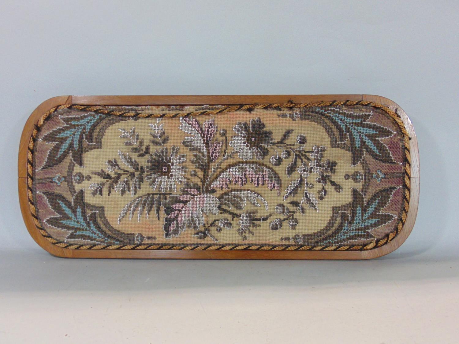 Late Victorian beadwork tray decorated with a floral spray with acanthus framing, rope braiding to