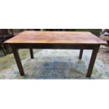 A provincial oak and pine kitchen table of rectangular form with plank top raised on four