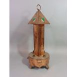 An unusual Arts & Crafts copper lamp/lantern with four bulb fittings, two switches, hammered
