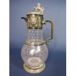 A good quality silver plated baluster claret jug with star cut glass, the silver plated top with