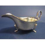 Viners silver Georgian style cream jug, with wavy rim and small cabriole feet, 15 cm long, 4.5 oz