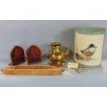 A mixed lot comprising a heavy Eastern brass teapot, a pair of Welsh walnut bookends decorated