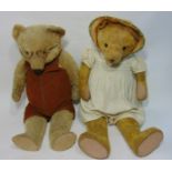 2 old teddy bears, both with slightly humped back, flat reinforced feet, glass eyes and stitched