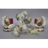 An unusual pair of 19th century continental vases each in the form of a pair of mice investigating a
