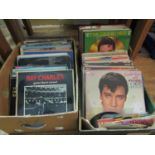 An extensive collection of 33rpm and 45rpm vinyl LPs and singles including a large number of Elvis