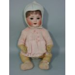 An Ernst Steinbacher bisque head baby doll (1900-1912), marked 'E.St.P 23 7½' Germany', sleeping