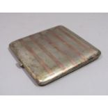 Good quality Arts & Crafts engine turned silver and gold banded cigarette case, maker Sibyl