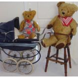 2 large vintage teddy bears with a wooden high chair and Silver Cross dolls pram; bears have