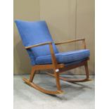 A vintage Parker Knoll rocking chair model number 973/4 993-5