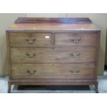An Edwardian mahogany bedroom chest in the Georgian style of two short over two long drawers