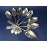 Set of eight silver bright cut table/serving spoons, marked Sterling and IW (possibly James