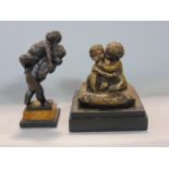 Bronze study of a stout nude child carrying a baby upon its back, 13 cm high; together with a