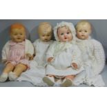 Four 20th century baby dolls including a 63cm tall doll marked Effanbee with composition head and