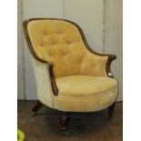 Mid 19th century upholstered drawing room chair with carved and moulded mahogany showwood frame with