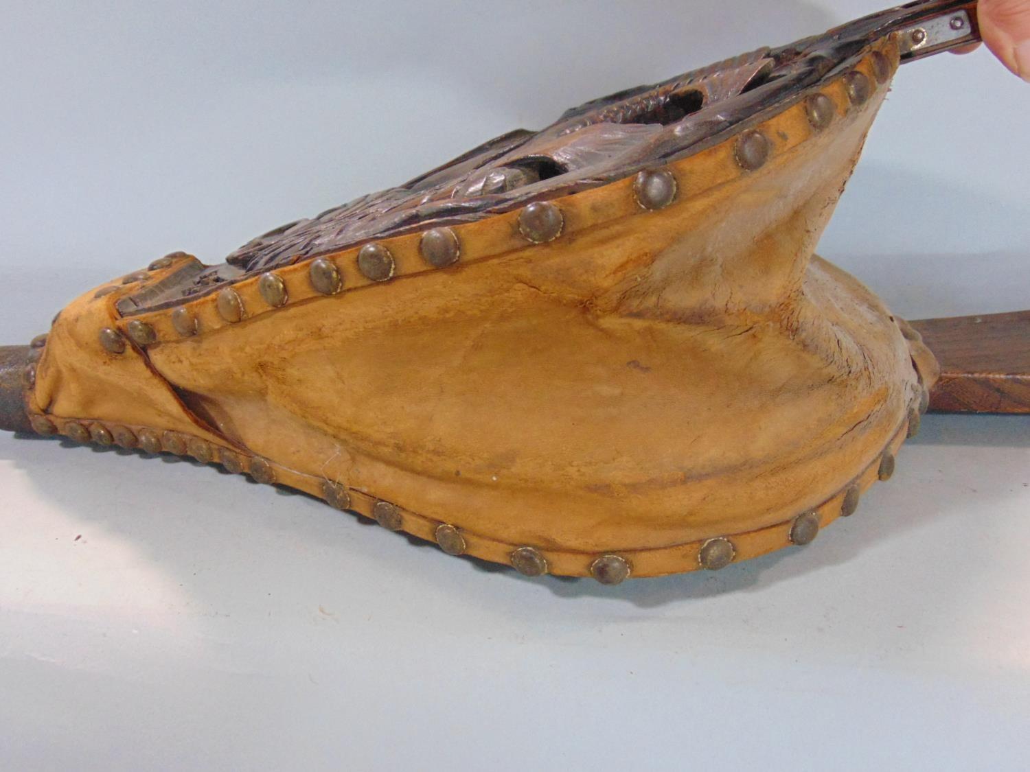 Pair of antique oak fire bellows carved with a coiled fish amidst reeds, with studded leather - Image 3 of 3