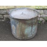 An old weathered copper with flared rim and riveted seams 52cm in diameter x 42 cm high