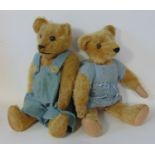 2 small 1930's teddy bears with stitched noses and claws, boot button eyes, long limbs, humped