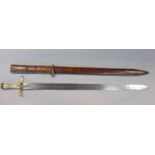 19th century Sudanese broad sword with leather scabbard, the blade with crested moon detail, the