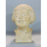French plaster bust carving of a girl with bob haircut, open mouth and teeth, inscribed F R. Cartier