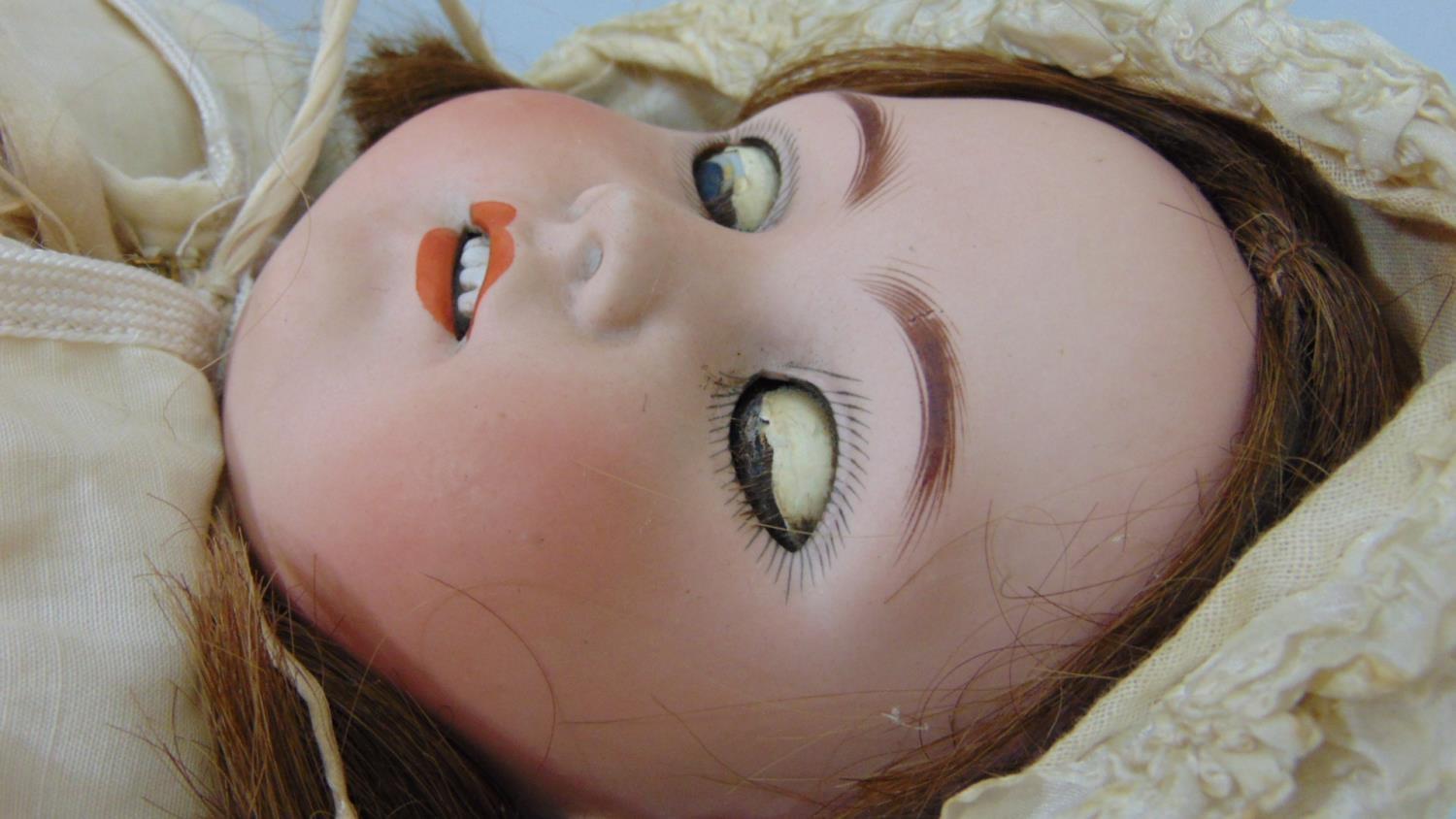 Doll by Simon & Halbig with bisque socket head with jointed pale coloured composition body. weighted - Image 3 of 5