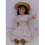 Early 20th century doll with bisque socket head by Simon & Halbig for CM Bergmann, with jointed