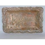 Eastern silver plated square dish, centrally embossed with a procession of rats carrying a sedan