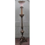 A brass lamp standard in the form of a 17th century brass pricket candlestand, the spiral twist