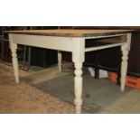 A Victorian pine farmhouse kitchen table of rectangular form with scrub top over a painted base with