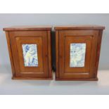 A pair of oak table top/small cabinets, with boxwood inlay and single panelled doors, each fitted