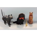 Unusual leather applied study of a standing cat with studded collar, 33 cm long, together with