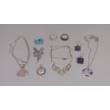Collection of silver jewellery to include a purple enamelled pendant in the style of Ortak, fairy