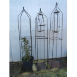 Three iron obelisks, max height 210 cm