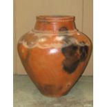 A large contemporary matt glazed globular pottery vase with crimped banded neck and incised