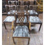 A set of seven (6&1) Edwardian mahogany dining chairs in a Chippendale manner, carved and pierced