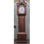 An early 19th century oak longcase clock, the door crossbanded in walnut, the hood enclosing a 33 cm
